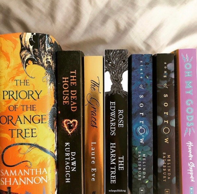 collection of books - the priory of the orange tree by samantha shannon, the dead house by dawn kurtagich, the graces by laure eve, the harm tree by rose edwards, state of sorrow and song of sorrow by melinda salisbury, oh my gods by alexandra sheppard