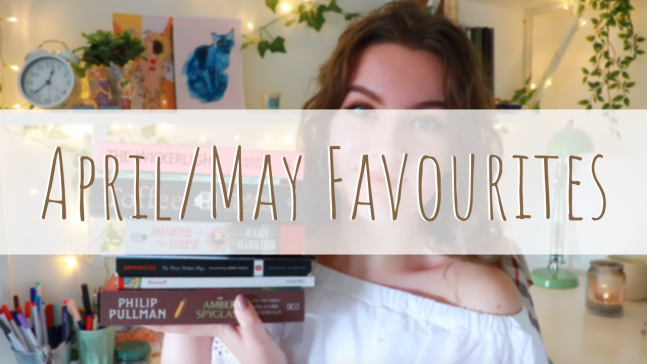 title image for may favourites - booktube wrap up thumbnail blurred in background, white banner across middle saying April/may favourites
